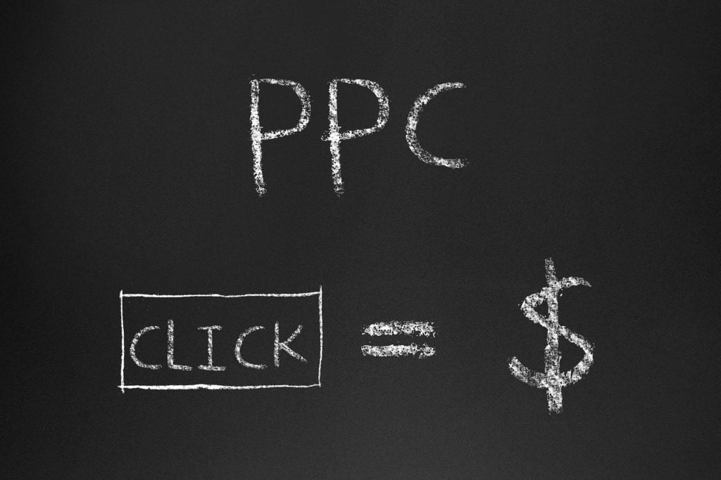 ppc advertising blackboard with money sign with your Average Cost Per Click